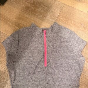 Bombshell Sportswear Gray Crop Top with Pink Zipper